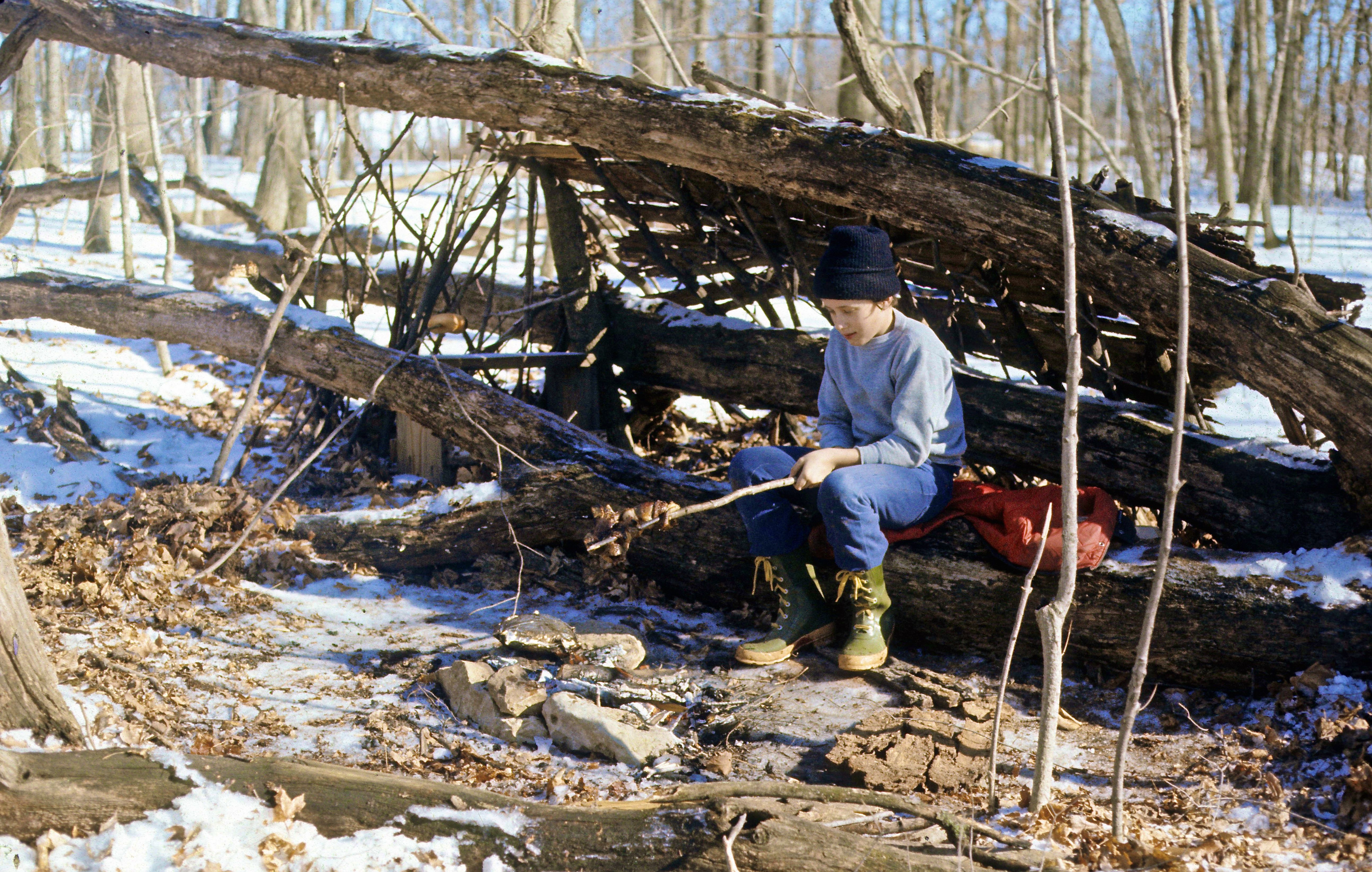 SURV-RICK COOKING AT CAMPFIRE